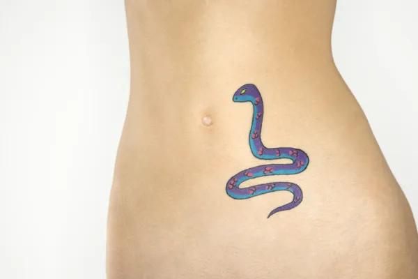 Designing a Stomach Tattoo Around Stretch Marks and Healing